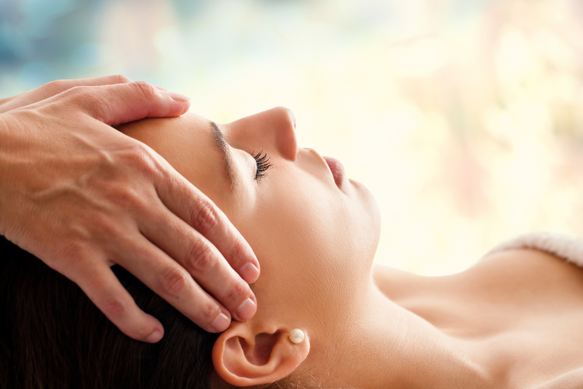 Woman having facial massage.